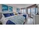 Inviting bedroom with two beds, ocean-themed decor, and sliding glass doors to a private balcony at 9650 Shore Dr. # 1805, Myrtle Beach, SC 29572