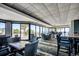 Elegant dining area with ocean views, featuring modern tables and seating at 9650 Shore Dr. # 1805, Myrtle Beach, SC 29572