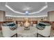 The building lobby showcases elegant decor, comfortable seating, and a stylish chandelier at 9650 Shore Dr. # 1805, Myrtle Beach, SC 29572