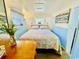Comfortable bedroom featuring a bed, two windows and cute, nautical themed decor at 6001 - N21 S Kings Hwy., Myrtle Beach, SC 29575