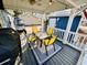 Charming covered patio features stylish furniture, ceiling fan, and decorative string lights perfect for outdoor relaxation at 6001 - N21 S Kings Hwy., Myrtle Beach, SC 29575