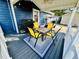 Cozy outdoor patio featuring stylish furniture, a grill, and views of the surrounding property at 6001 - N21 S Kings Hwy., Myrtle Beach, SC 29575