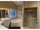 Bright bathroom boasts a soaking tub, walk-in shower, and dual sinks at 3517 Golf Ave., Little River, SC 29566