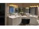 Bathroom featuring dual sinks, vanity space, and modern fixtures at 3517 Golf Ave., Little River, SC 29566