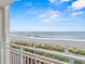 Scenic balcony view overlooking a pristine beach and the tranquil ocean, perfect for relaxation and enjoying coastal breezes at 1207 S Ocean Blvd. # 20308, Myrtle Beach, SC 29577