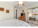 Cozy bedroom featuring mirrored closet doors and a ceiling fan at 4390 Daphne Ln. # H, Murrells Inlet, SC 29576