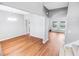 Bright living room featuring hardwood floors and a neutral color palette, open layout to a spacious area with large windows at 629 Slash Pine Ct., Myrtle Beach, SC 29579