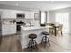 Modern kitchen with white cabinets, stainless steel appliances, a kitchen island, and wood-style flooring at 1055 Oak Meadow Dr., Conway, SC 29526