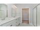 Bright bathroom featuring double vanity, marble floors, and a glass-enclosed shower at 748 Rupert Dr, Conway, SC 29526