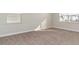 Bright bedroom with carpet, two windows and neutral walls at 748 Rupert Dr, Conway, SC 29526