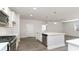 Spacious kitchen with stainless steel appliances, granite countertops, and ample cabinet space at 748 Rupert Dr, Conway, SC 29526