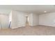 Spacious living room featuring neutral carpeting and multiple doorways at 748 Rupert Dr, Conway, SC 29526