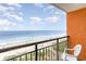 Expansive balcony view overlooking the sandy beach and ocean with clear blue skies at 1501 South Ocean Blvd. # 644, Myrtle Beach, SC 29577