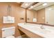 Bathroom with a large mirror, vanity, sink, and toilet at 1501 South Ocean Blvd. # 644, Myrtle Beach, SC 29577