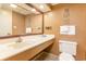 Bathroom with a large mirror, vanity, sink, and toilet at 1501 South Ocean Blvd. # 644, Myrtle Beach, SC 29577