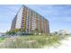 Expansive condominium building with numerous balconies, showcasing beachside living and ocean views at 1501 South Ocean Blvd. # 644, Myrtle Beach, SC 29577