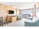 Living room features a sofa, chair, TV, dresser and access to an ocean view balcony at 1501 South Ocean Blvd. # 644, Myrtle Beach, SC 29577