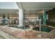 Indoor hot tub, featuring tiled accents and accessible railings at 1501 South Ocean Blvd. # 644, Myrtle Beach, SC 29577