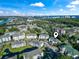 Aerial view of complex shows beach, waterway, and landscaping at 1100 Commons Blvd. # 104, Myrtle Beach, SC 29572