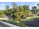 Picturesque pond view with fountain and lush landscaping, perfect for relaxation at 1100 Commons Blvd. # 104, Myrtle Beach, SC 29572