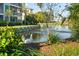 View of a duck in a pond with a view of apartment buildings at 1100 Commons Blvd. # 104, Myrtle Beach, SC 29572