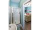 Clean bathroom with shower stall and view into living area at 1612 Edge Dr., North Myrtle Beach, SC 29582