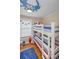 bedroom with a white bunk bed and nautical themed decor at 1612 Edge Dr., North Myrtle Beach, SC 29582