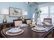 Coastal-themed dining room with a dark wood table and blue and white accents at 1612 Edge Dr., North Myrtle Beach, SC 29582