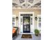 Front entrance with a navy blue door and welcome mat at 1612 Edge Dr., North Myrtle Beach, SC 29582
