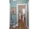 Hallway with beach-themed decor leading to bedroom at 1612 Edge Dr., North Myrtle Beach, SC 29582