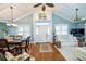 Open living space with hardwood floors, white sofas, and a view of the front entryway at 1612 Edge Dr., North Myrtle Beach, SC 29582