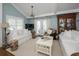 Relaxing living room featuring hardwood floors, white sofas, and a charming coastal aesthetic at 1612 Edge Dr., North Myrtle Beach, SC 29582