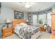 Traditional bedroom with a window seat and decor on shelves, plus side tables and a ceiling fan at 376 Mckendree Ln., Myrtle Beach, SC 29579
