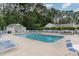 Community pool and leisure area with lounge chairs and shade umbrellas at 376 Mckendree Ln., Myrtle Beach, SC 29579