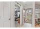 Entryway view leading into a cozy bedroom with a ceiling fan and a decorative glass storm door at 376 Mckendree Ln., Myrtle Beach, SC 29579