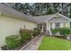 Welcoming home entrance with manicured landscaping and a charming facade at 376 Mckendree Ln., Myrtle Beach, SC 29579