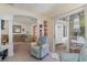 Open-concept living room with bright neutral tones with access to the patio at 376 Mckendree Ln., Myrtle Beach, SC 29579