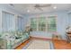 Cozy living room with bright natural light and light blue walls at 376 Mckendree Ln., Myrtle Beach, SC 29579