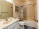 Well-lit bathroom with a shower and bathtub combo and a large mirror at 2060 Cross Gate Blvd. # 305, Surfside Beach, SC 29575