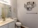 Clean bathroom with white vanity, modern fixtures and decorative accents at 2060 Cross Gate Blvd. # 305, Surfside Beach, SC 29575