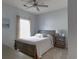 Cozy bedroom with a ceiling fan and a window to let in natural light at 2060 Cross Gate Blvd. # 305, Surfside Beach, SC 29575