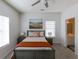 Inviting bedroom featuring neutral tones and an ensuite bathroom at 2060 Cross Gate Blvd. # 305, Surfside Beach, SC 29575