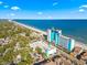 Aerial view showcasing the condominium complex, the beach, and the ocean at 2805 N Ocean Blvd. # 214, Myrtle Beach, SC 29577