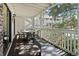 Relaxing balcony with table and seating offering views of lush landscape at 2805 N Ocean Blvd. # 214, Myrtle Beach, SC 29577