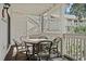 Inviting balcony with dining table and chairs, perfect for outdoor relaxation at 2805 N Ocean Blvd. # 214, Myrtle Beach, SC 29577