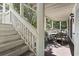 Cozy balcony features staircase and a comfortable dining area at 2805 N Ocean Blvd. # 214, Myrtle Beach, SC 29577