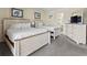Charming bedroom features two cozy beds and a mounted flatscreen television at 2805 N Ocean Blvd. # 214, Myrtle Beach, SC 29577