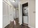 Hallway view with washer and dryer closet and access to other rooms at 2805 N Ocean Blvd. # 214, Myrtle Beach, SC 29577