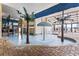 A bright and fun indoor pool with water features and palm trees at 2805 N Ocean Blvd. # 214, Myrtle Beach, SC 29577