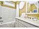 Bathroom with white cabinets and a vanity mirror at 4808 Cantor Ct., North Myrtle Beach, SC 29582